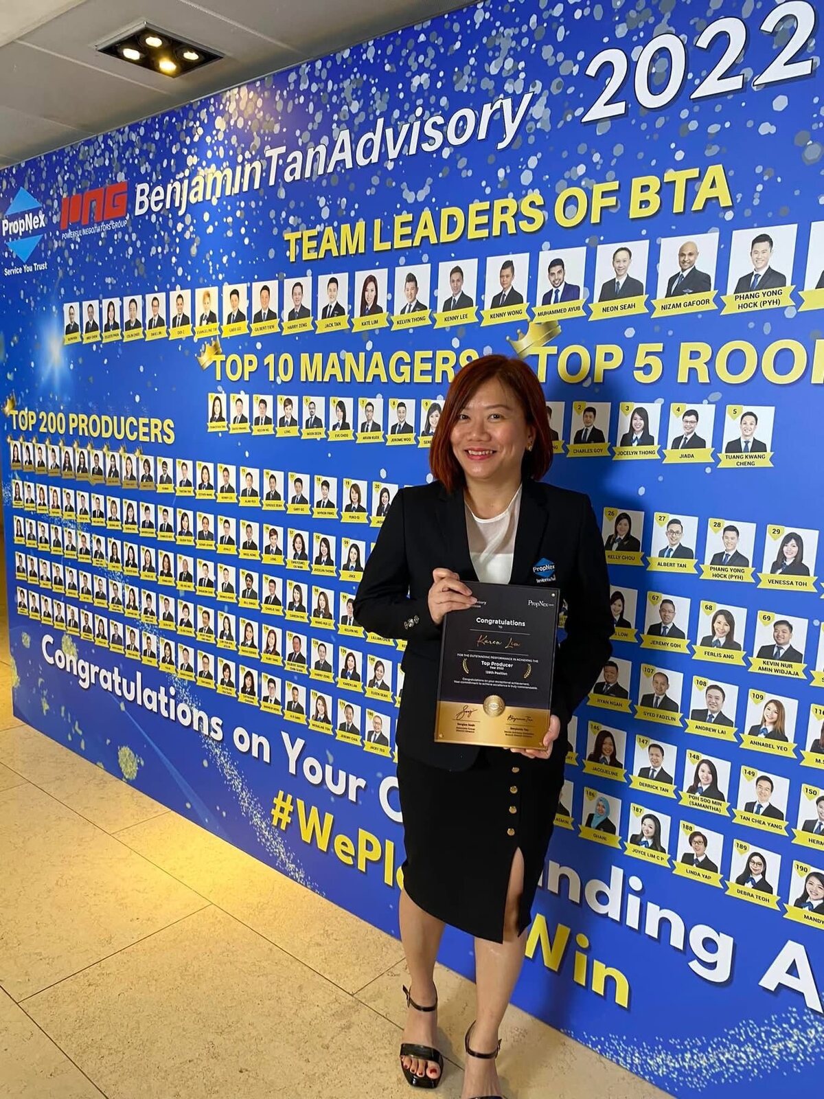 Karen Lim at the Benjamin Tan Advisory 2022 producers wall